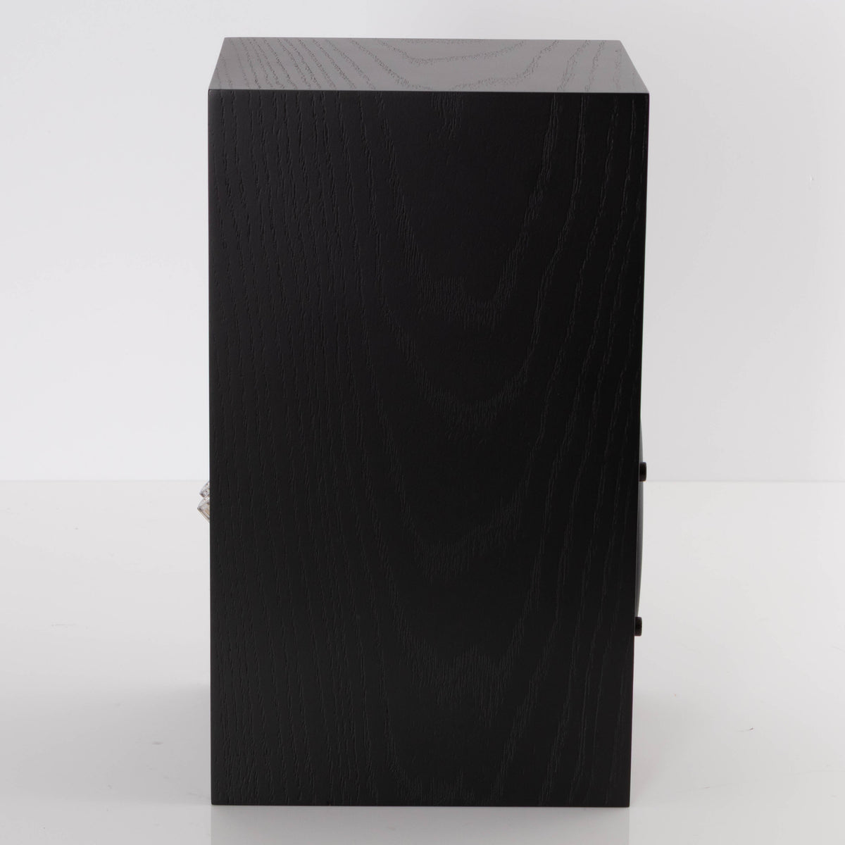 Left side view of a used Spendor A1.2 Standmount Speaker in a Black Oak finish