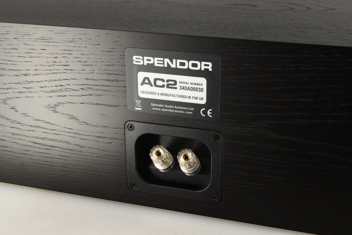 Close up of a used Spendor AC2 Centre Speaker in a black oak finish showing some of the rear