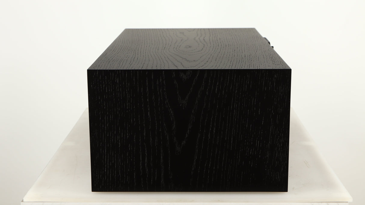 Left side view of a used Spendor AC2 Centre Speaker in a black oak finish