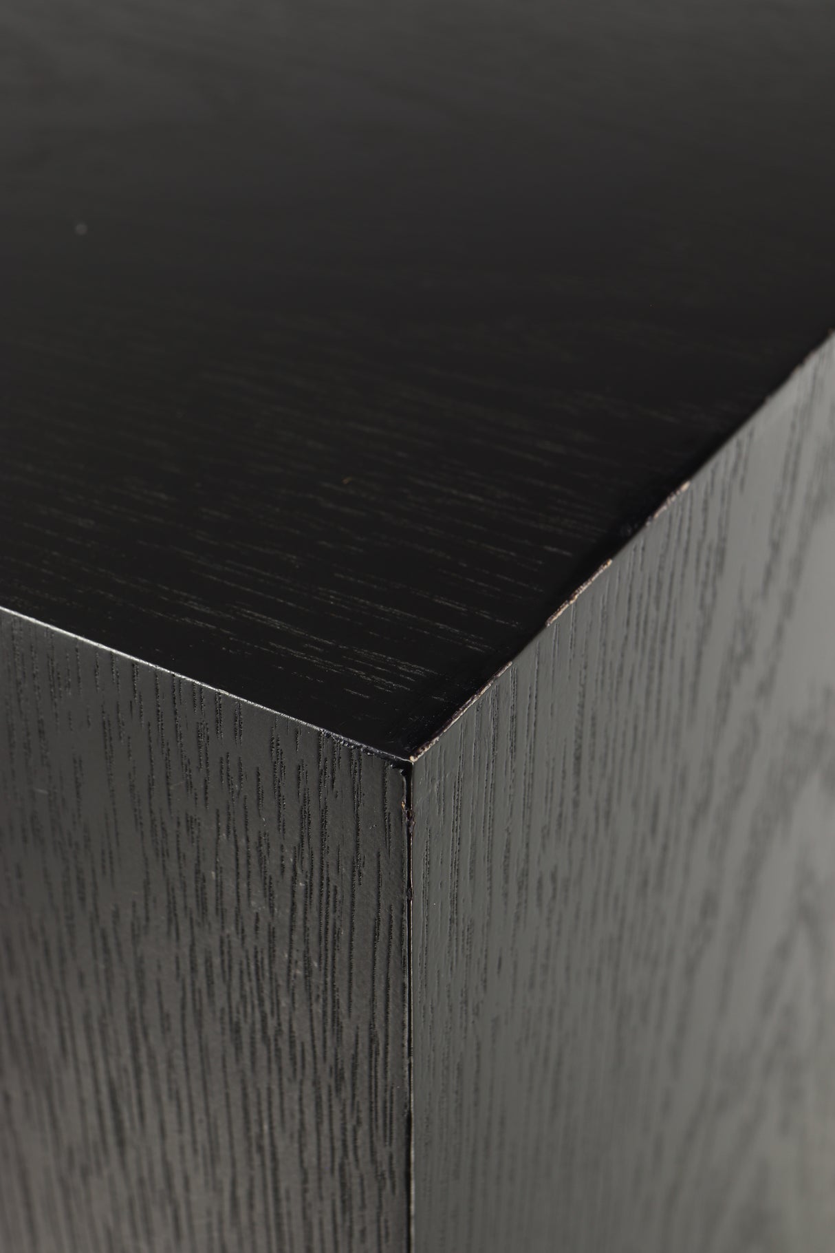 Close up of a used Spendor D9.2 Floorstanding Speaker in a black oak finish showing some damage on top