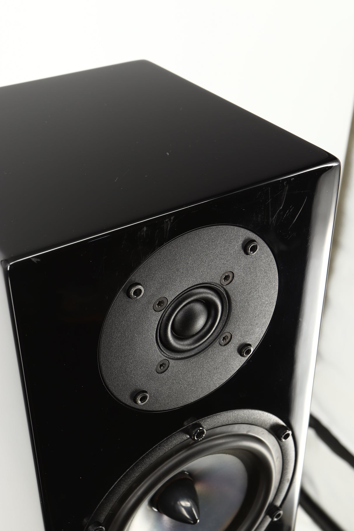 Close up view of a used Spendor SA1 Standmount Speaker in Gloss Black with Stand