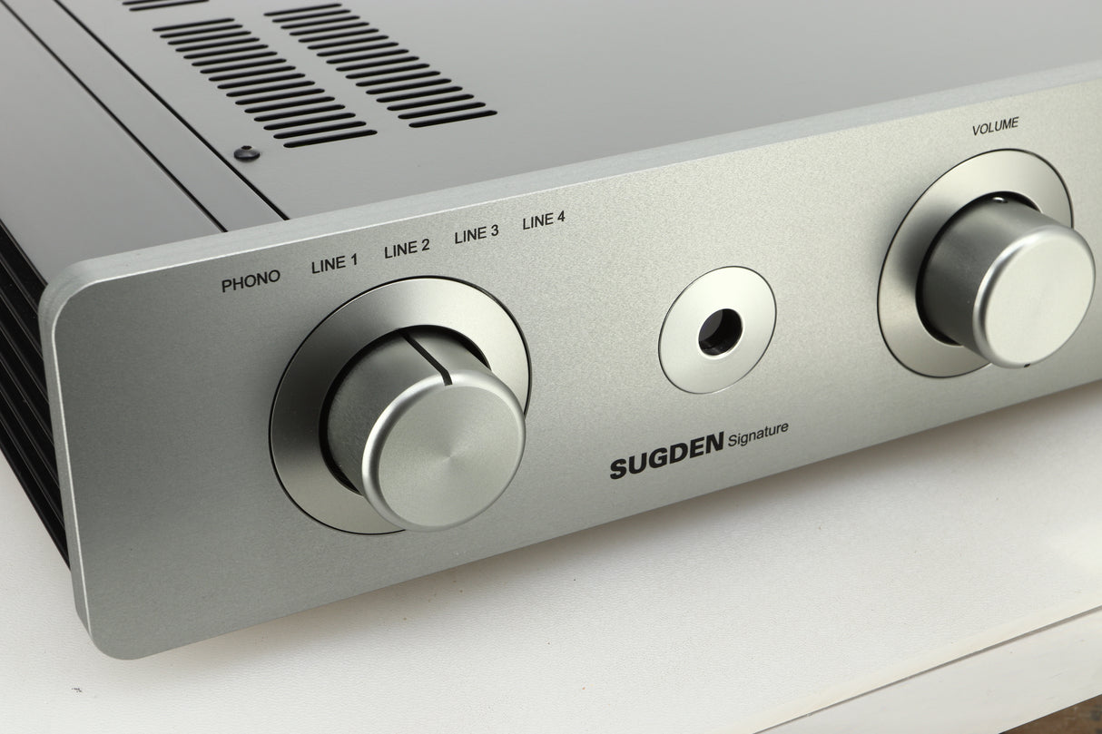 Close up view of a used Sugden A21 I-S Integrated Amplifier in Titanium finish showing the left side of the fascia