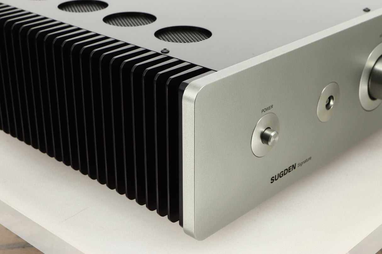 Front left corner view of a used Sugden A21 SE Signature Integrated Amplifier in Titanium finish