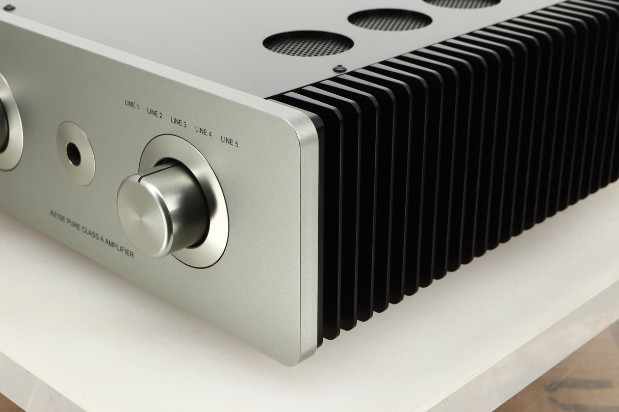 Front right corner view of a used Sugden A21 SE Signature Integrated Amplifier in Titanium finish