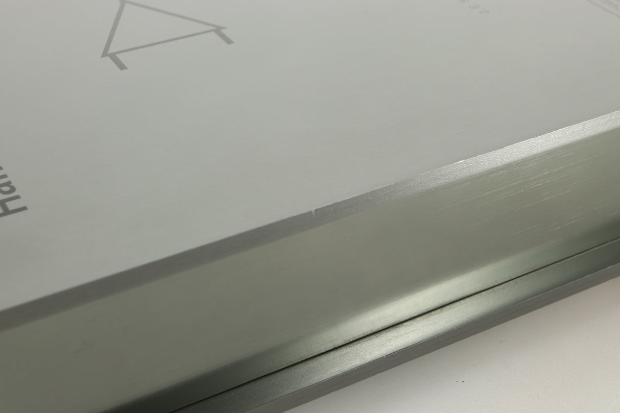 Close up of a used Sugden Bijou Ampmaster Power Amplifier in a silver finish showing some marking on left side