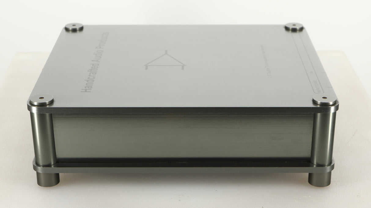 Left side view of a used Sugden Bijou Ampmaster Power Amplifier in a silver finish