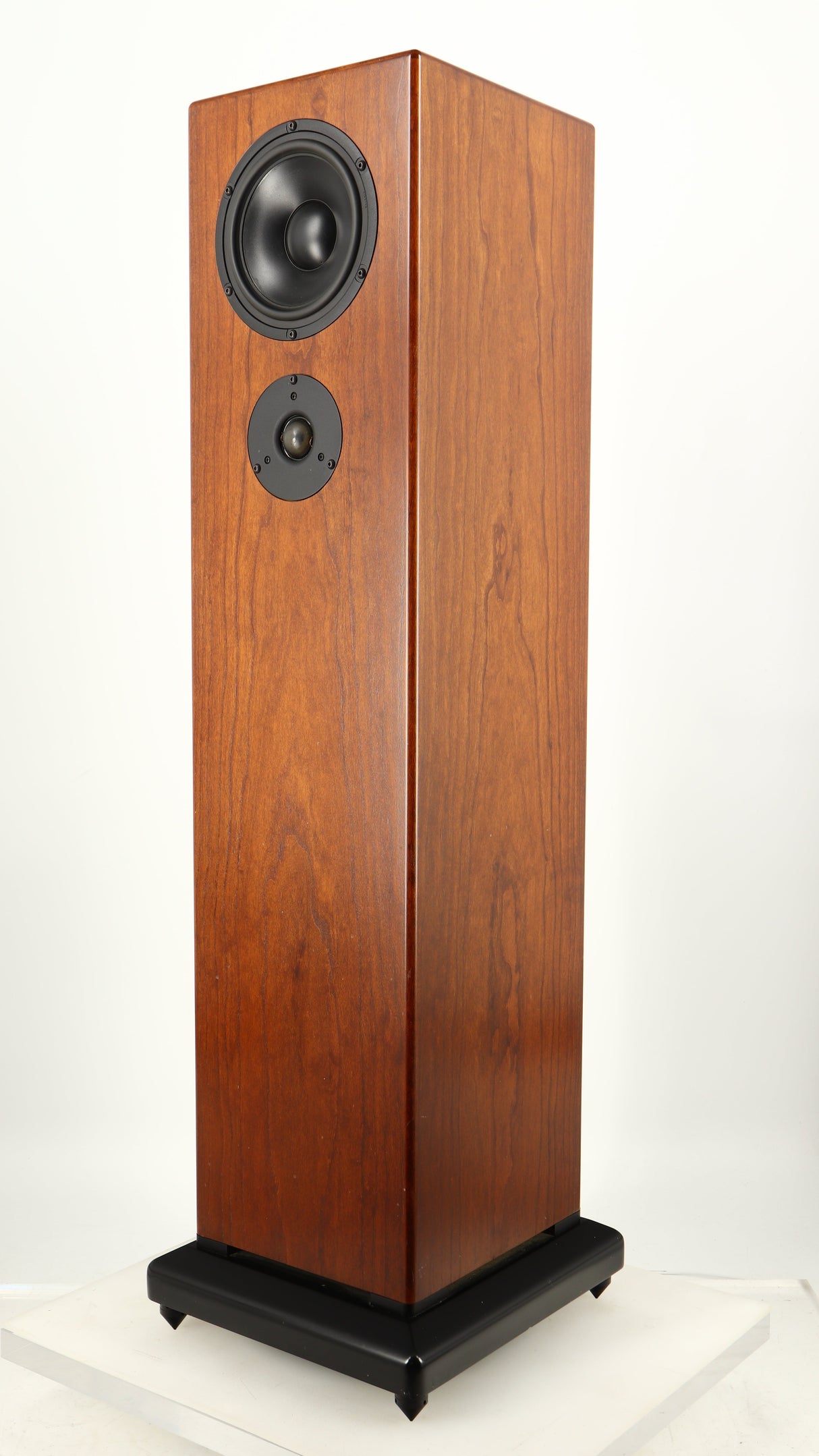 Front right corner of a used Sugden LS-21 Floorstanding Speaker in a dark cherry finish