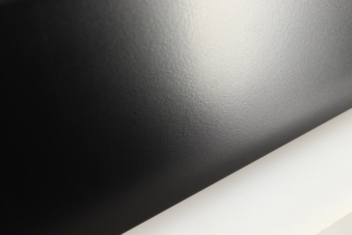 Close up of a used Sugden Masterclass ANV-50 Integrated Amplifier in a graphite finish showing scratch on right side