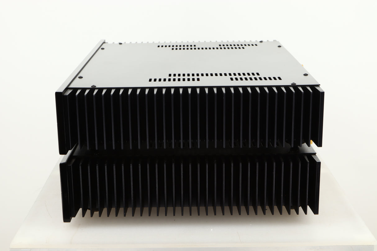 Side view of a used pair of Sugden Symetra Monoblock Power Amplifiers