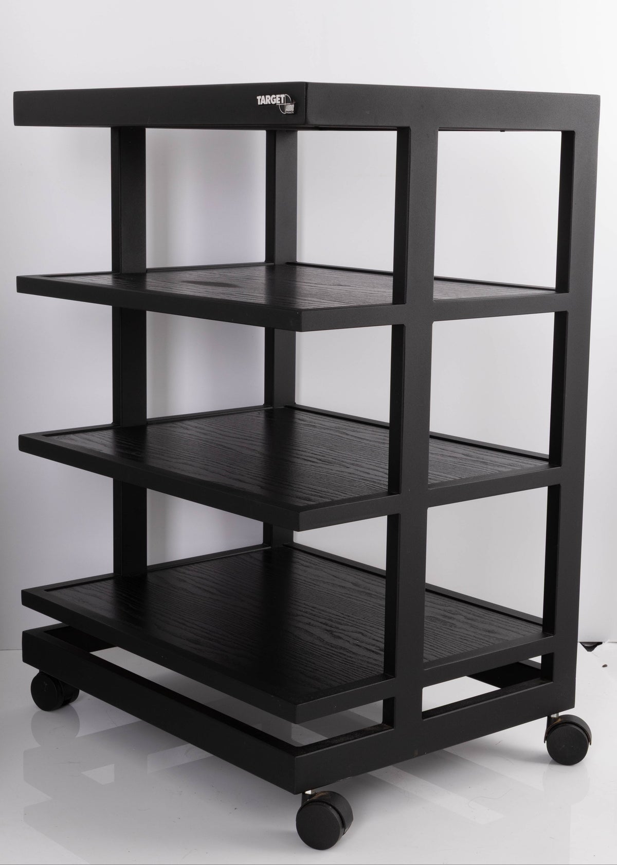 Front right corner of a used Target 3 Shelf Hifi Stand W/ Castors in a Black finish