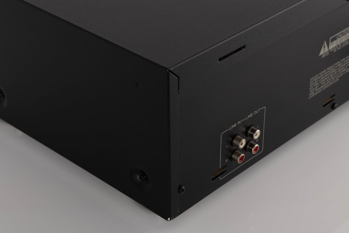 Rear right corner of a used TEAC V-1050 Cassette Deck in a Black finish