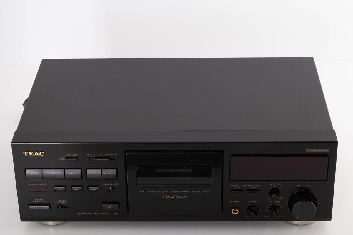 Top of a used TEAC V-1050 Cassette Deck in a Black finish