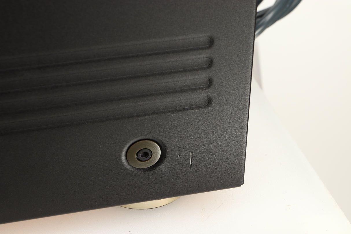 Close up view of used Teac VRDS-T1 CD Transport in Black finish showing a scratch on the right side towards the back