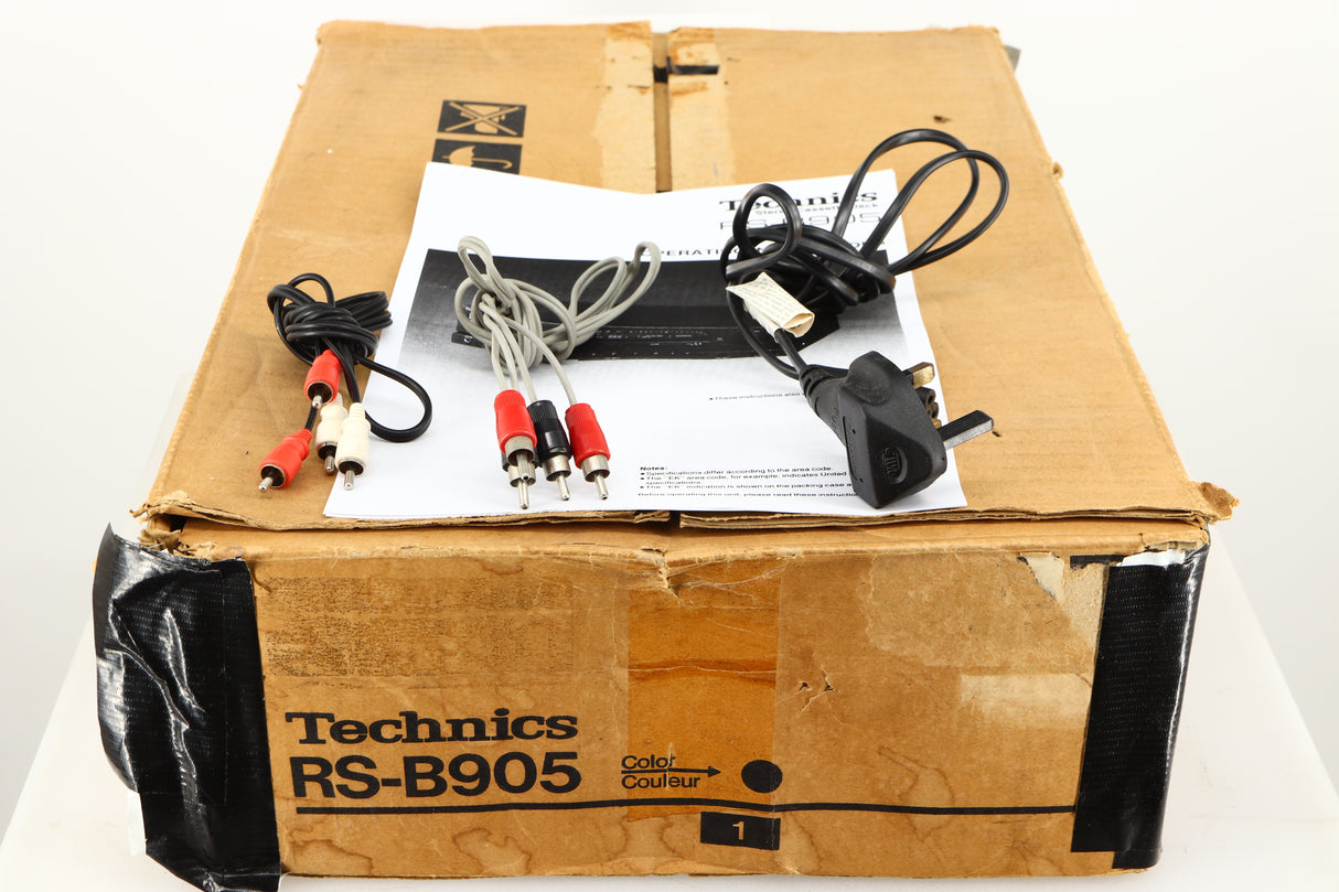 Box for a used Technics RS-B905 Cassette Deck showing Power Cable, Manual and 2x Interconnect Cables