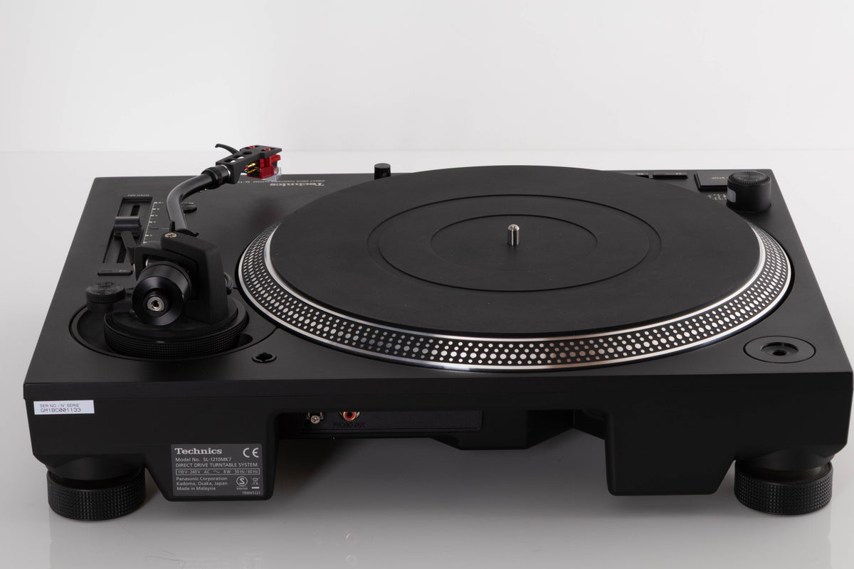 Rear view of a used Technics SL-1210 MK7 Turntable with AT-40ML Cartridge