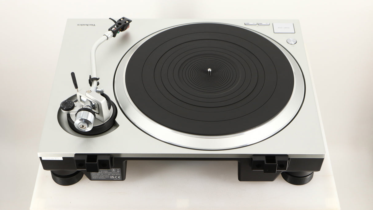 Rear view of a used Technics SL-1500C Turntable in a silver finish
