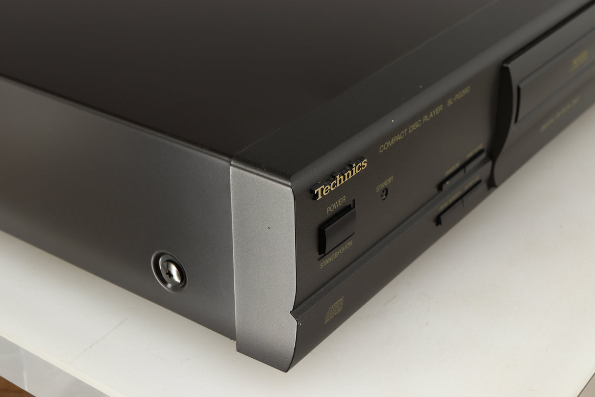 Front left corner of a used Technics SL-PG390EB-K CD Player in a grey finish
