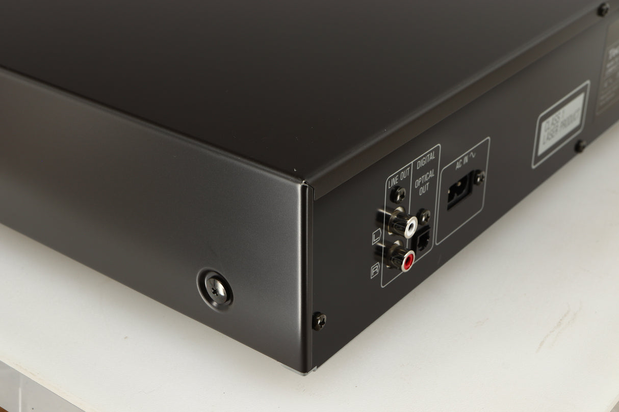 Rear right corner of a used Technics SL-PG390EB-K CD Player in a grey finish