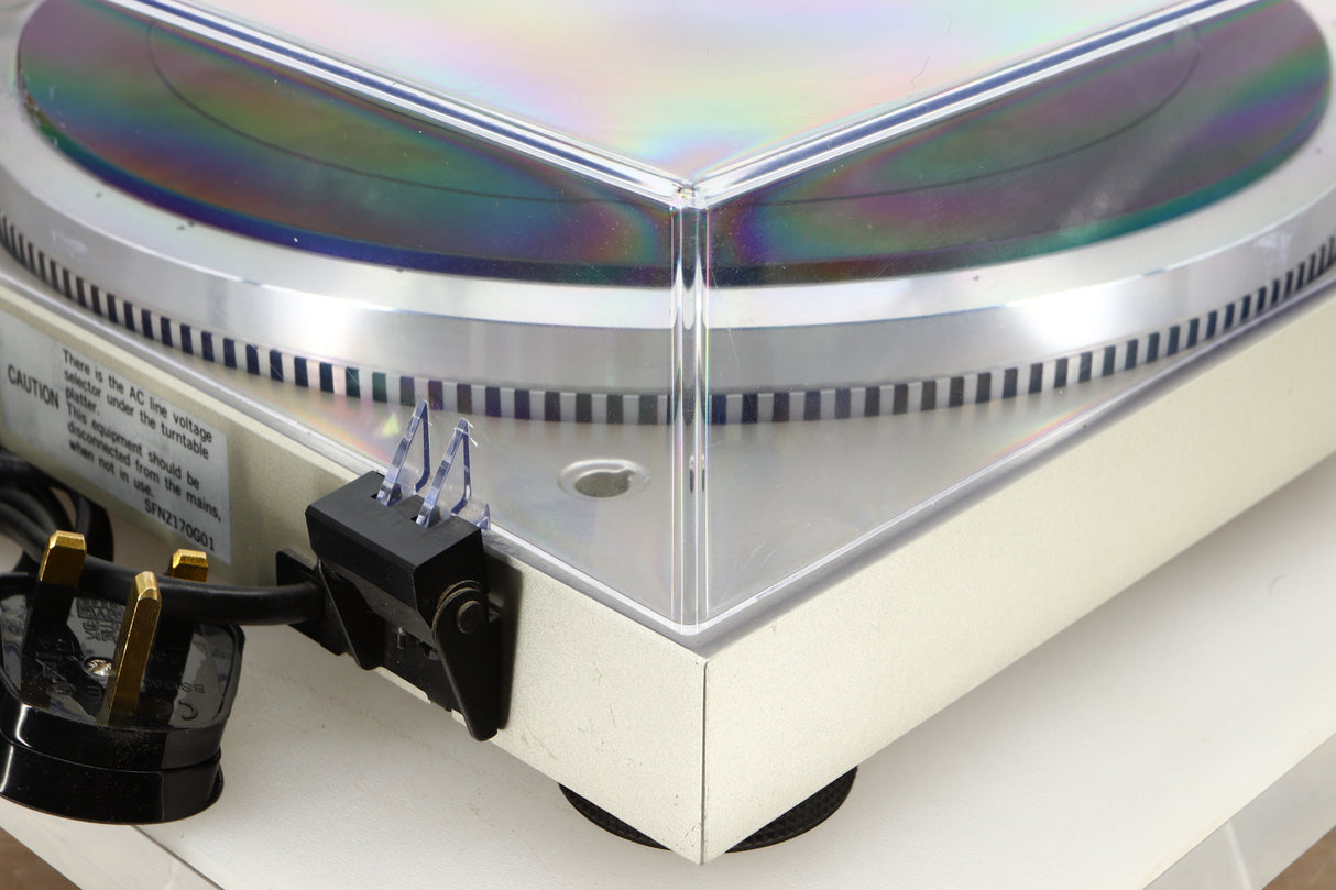 Rear right corner view of a used Technics SL-Q2 Direct Driver Turntable in Silver