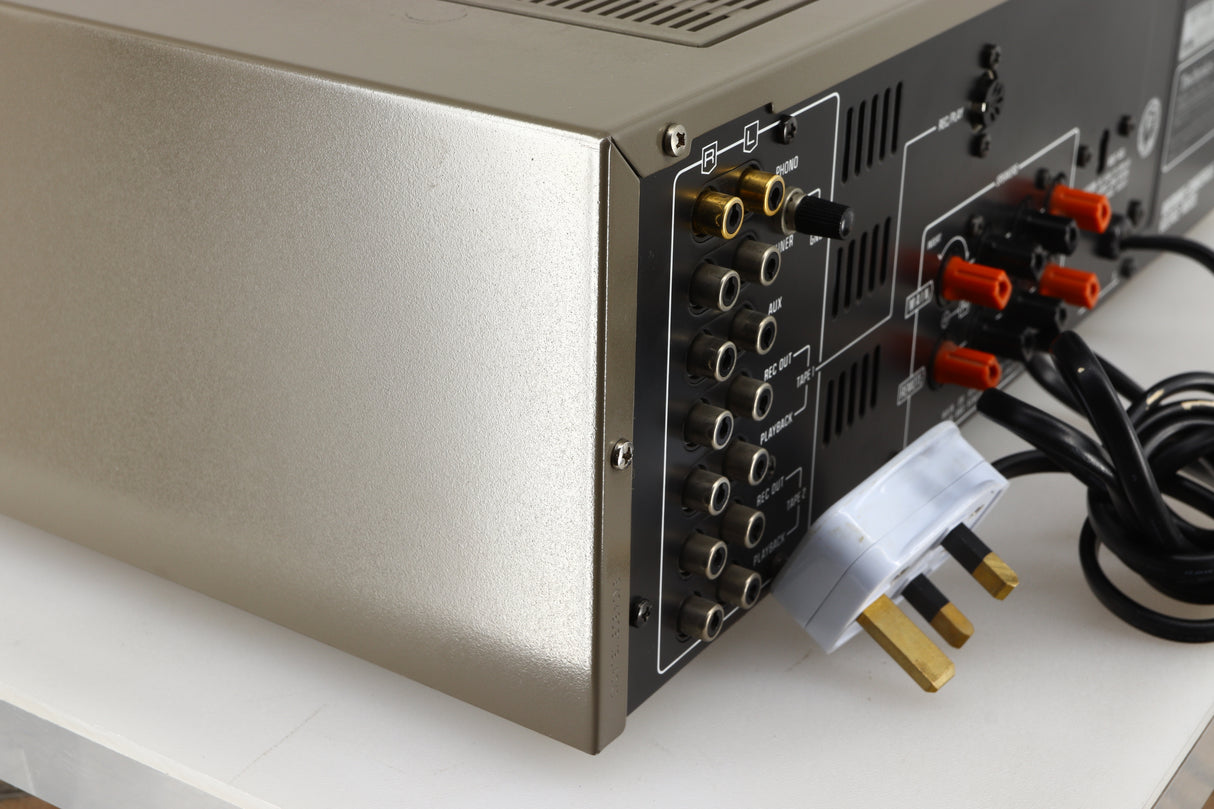 Rear right corner of a used Technics SU-V4 Integrated Amplifier in a silver finish