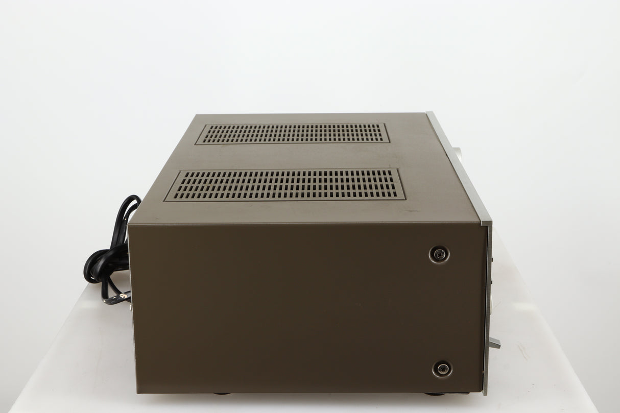 Left side view of a used Technics SU-V4 Integrated Amplifier in a silver finish