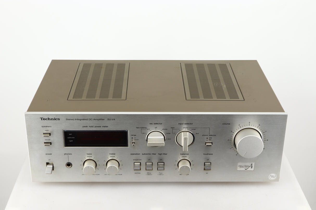 Top of a used Technics SU-V4 Integrated Amplifier in a silver finish