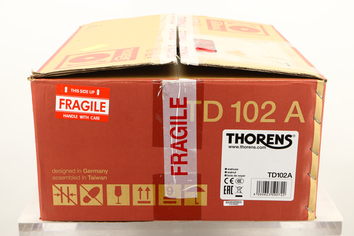 Box of a used Thorens TD-102A Turntable in Walnut finish