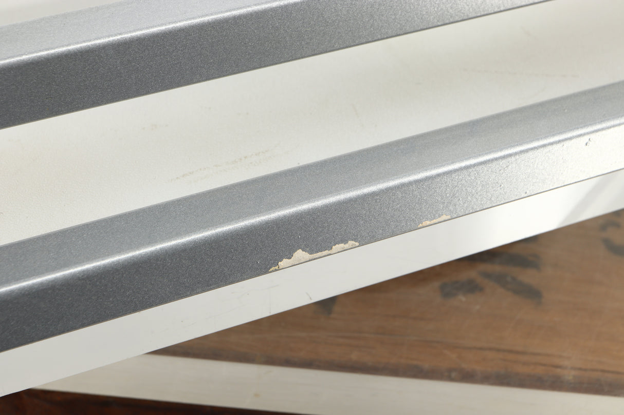 Close up of a used TTW Turntable Wall Mount in a silver finish showing scratch