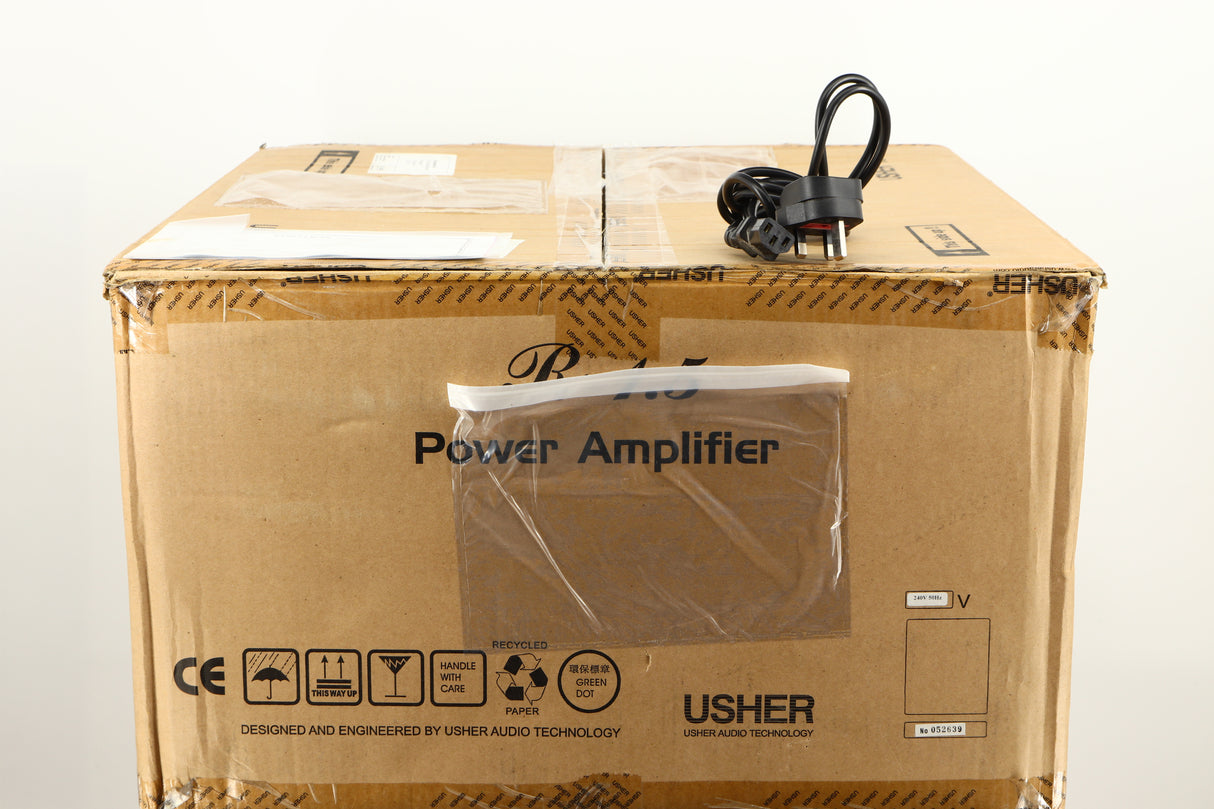 Box for a used Usher R1.5 Power Amplifier in a silver finish