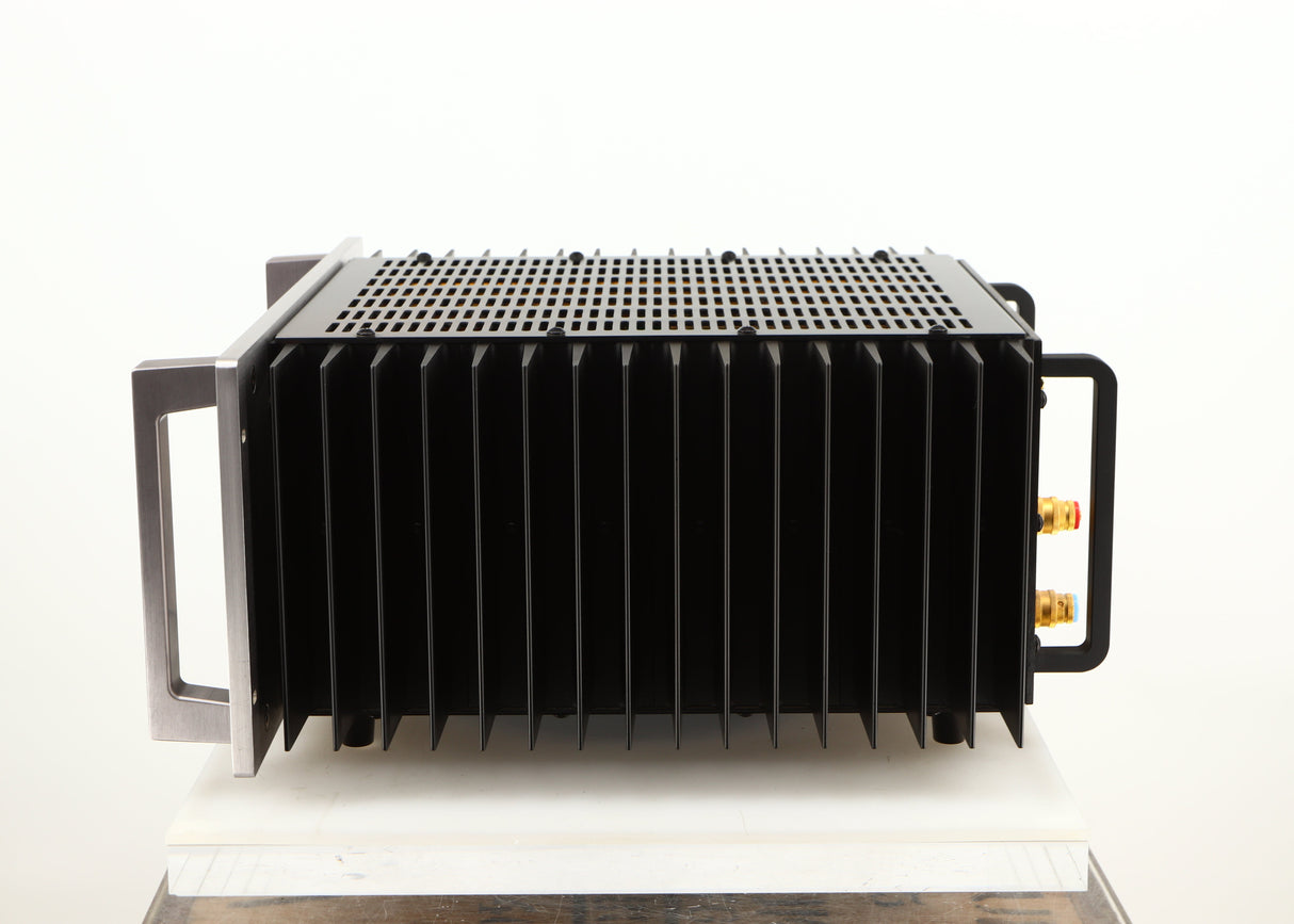 Right side view of a used Usher R1.5 Power Amplifier in a silver finish