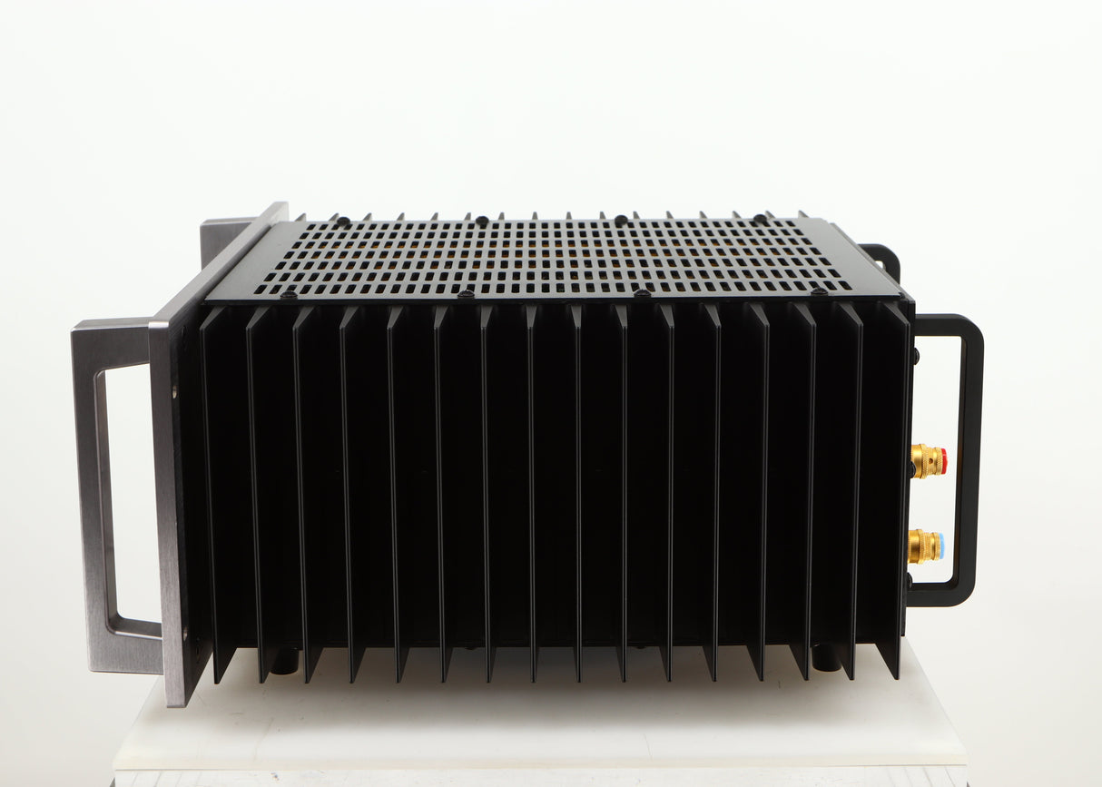 Right side view of a used Usher R1.5 Power Amplifier in a silver finish