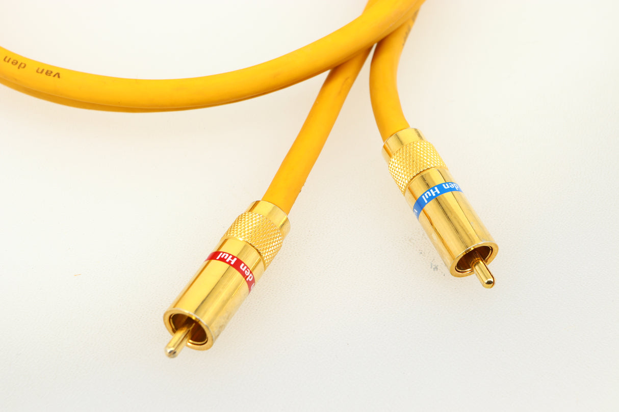 Close up of a used Van Den Hul D-102 MKIII Interconnect 0.8m Cable in a yellow finish showing the connectors
