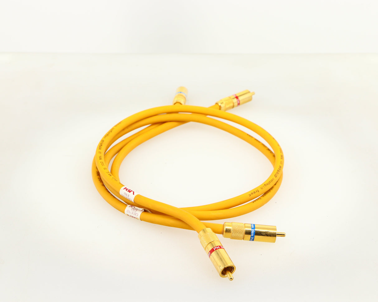 Left side view of a used Van Den Hul D-102 MKIII Interconnect 0.8m Cable in a yellow finish