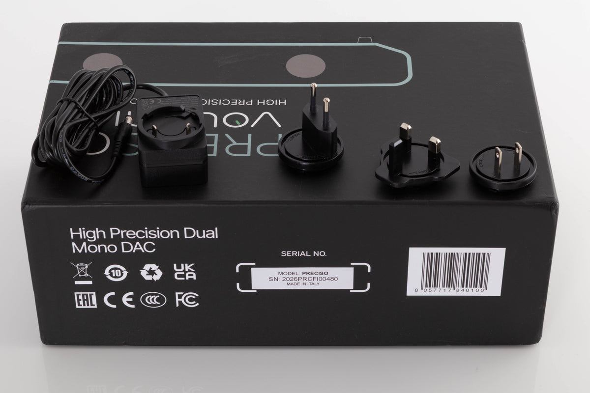 Box for a used Volumio Preciso Digital Analogue Converter in a Silver finish showing PSU, Schuko Plug and Mains Plug
