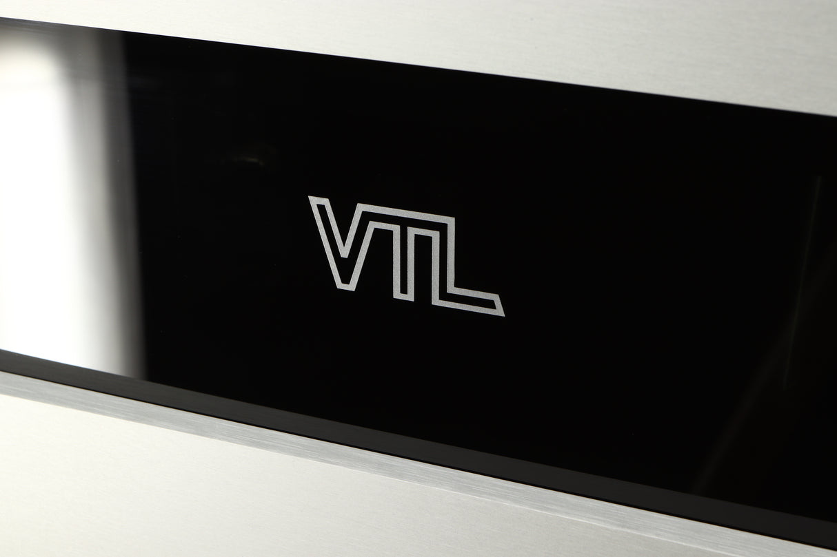 Close up of a used VTL ST85 Power Amplifier in a silver finish showing logo on fascia