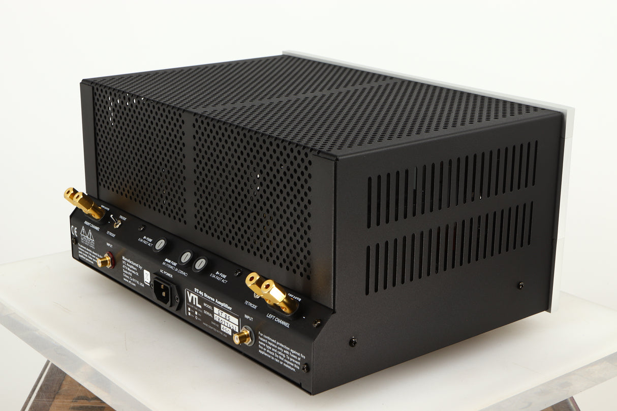 Rear left corner of a used VTL ST85 Power Amplifier in a silver finish