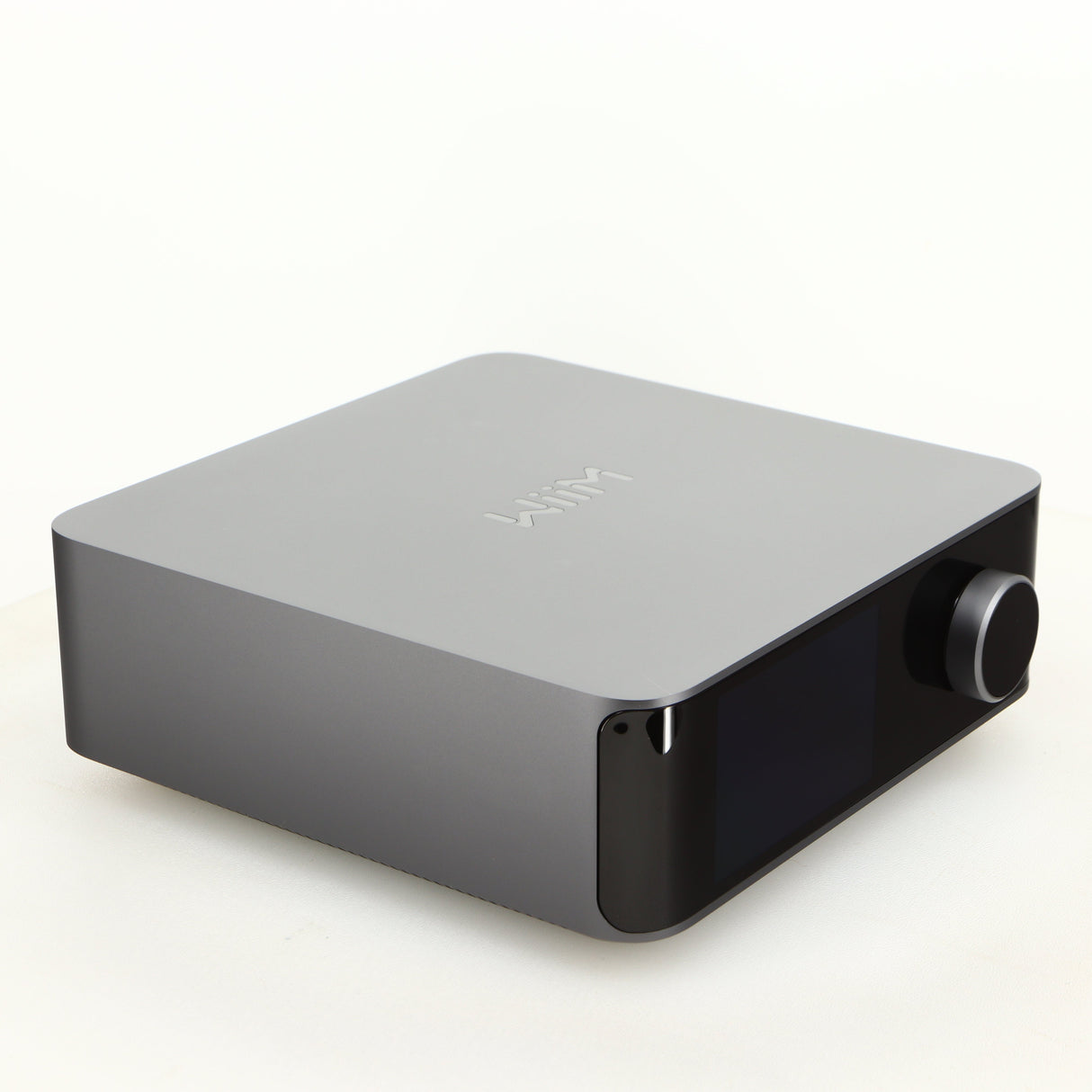 Front left corner of a used Wiim Amp Ultra Streaming Amplifier in a grey finish