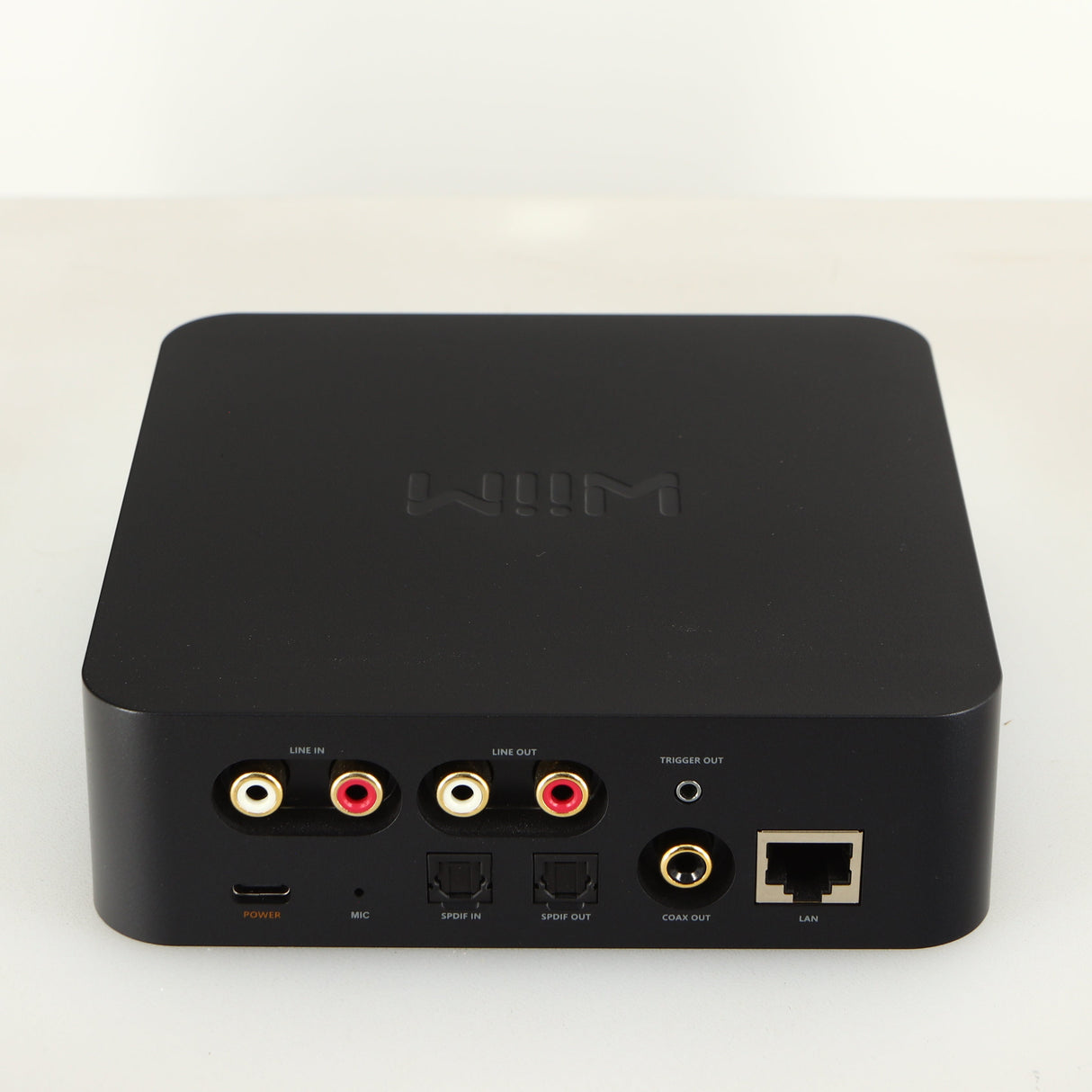 Rear view of a used WiiM Pro Streamer showing USB Input, Phono Inputs, Phono Outputs, Network Input, Optical Input and Optical Output
