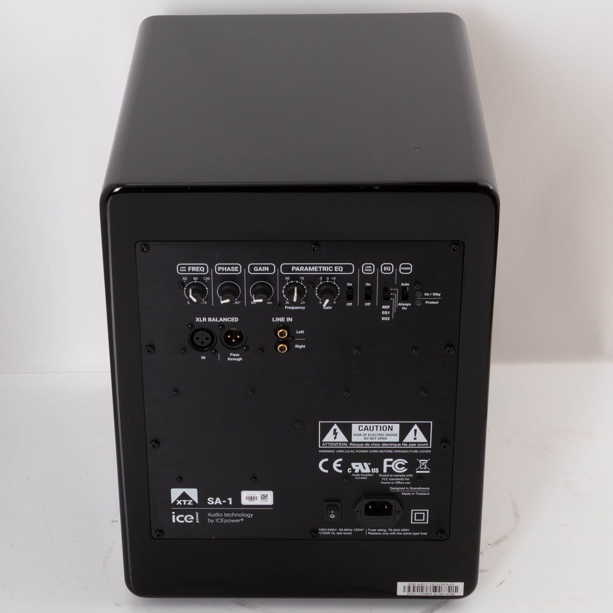 Rear view of a used XTZ SA-1 Subwoofer in a Gloss Black finish showing Mains Input, XLR Input and Phono Inputs