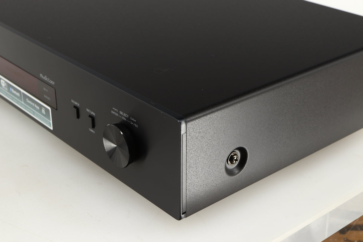 Front right corner of a used Yamaha NP-S303 Musicast Streamer in a black finish