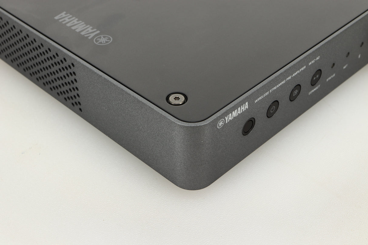 Front left corner view of a used Yamaha WXC-50 Streaming Pre Amplifier in Silver finish