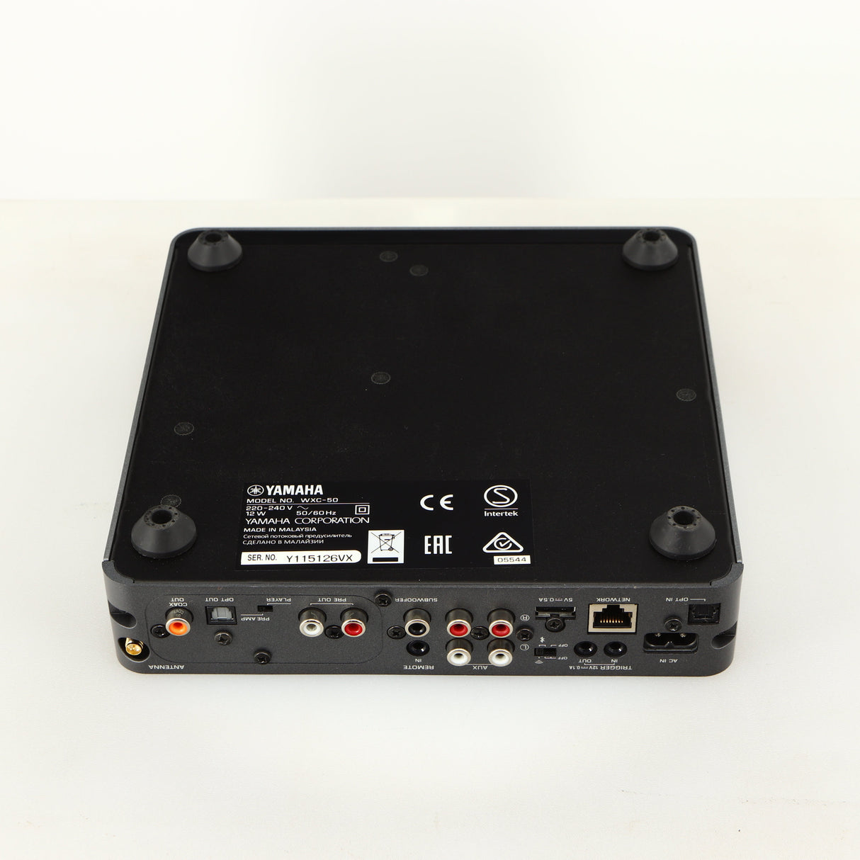 Bottom of a used Yamaha WXC-50 Streaming Pre Amplifier in a silver finish