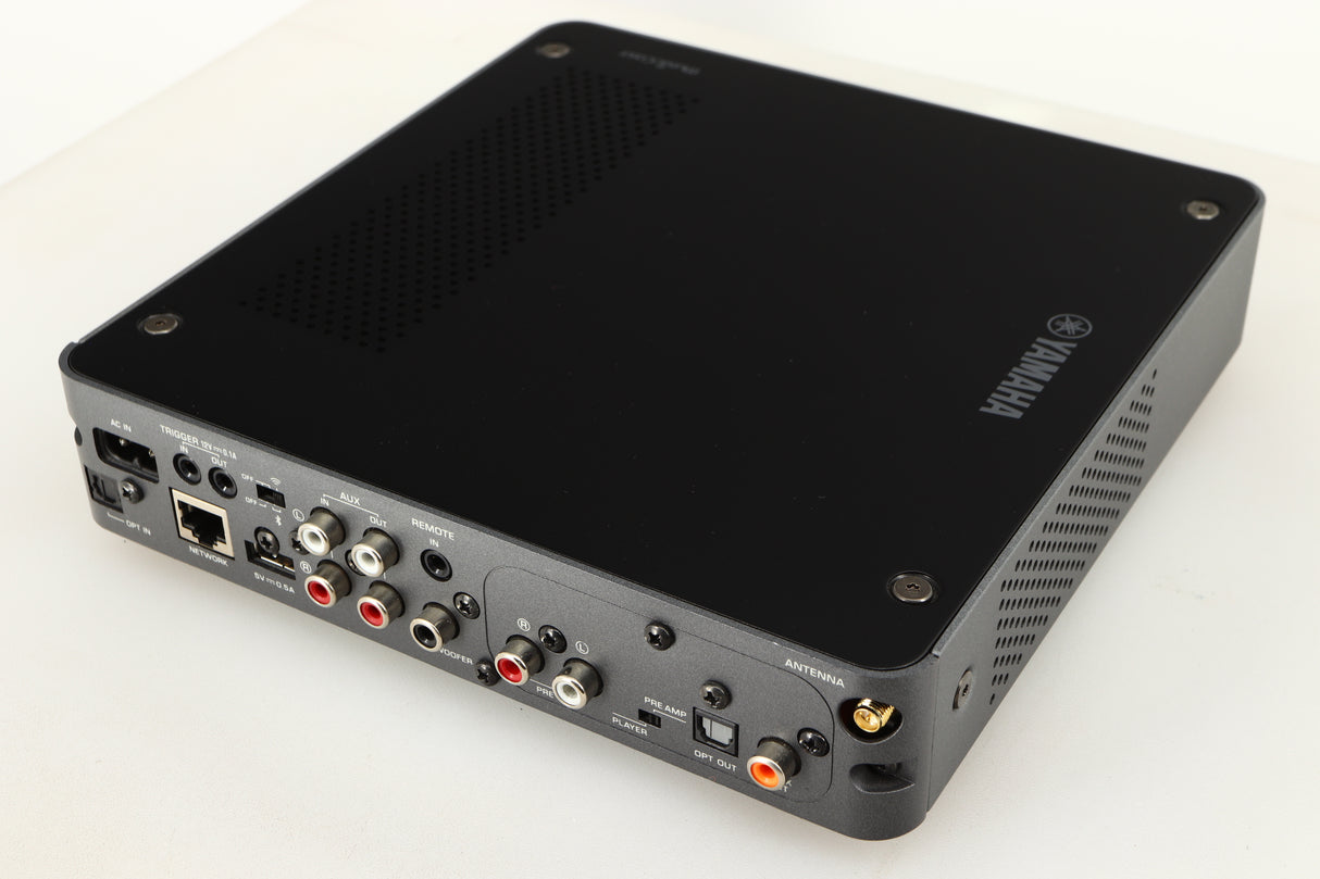Close up of a used Yamaha WXC-50 Streaming Pre Amplifier in a silver finish showing light scratch on rear