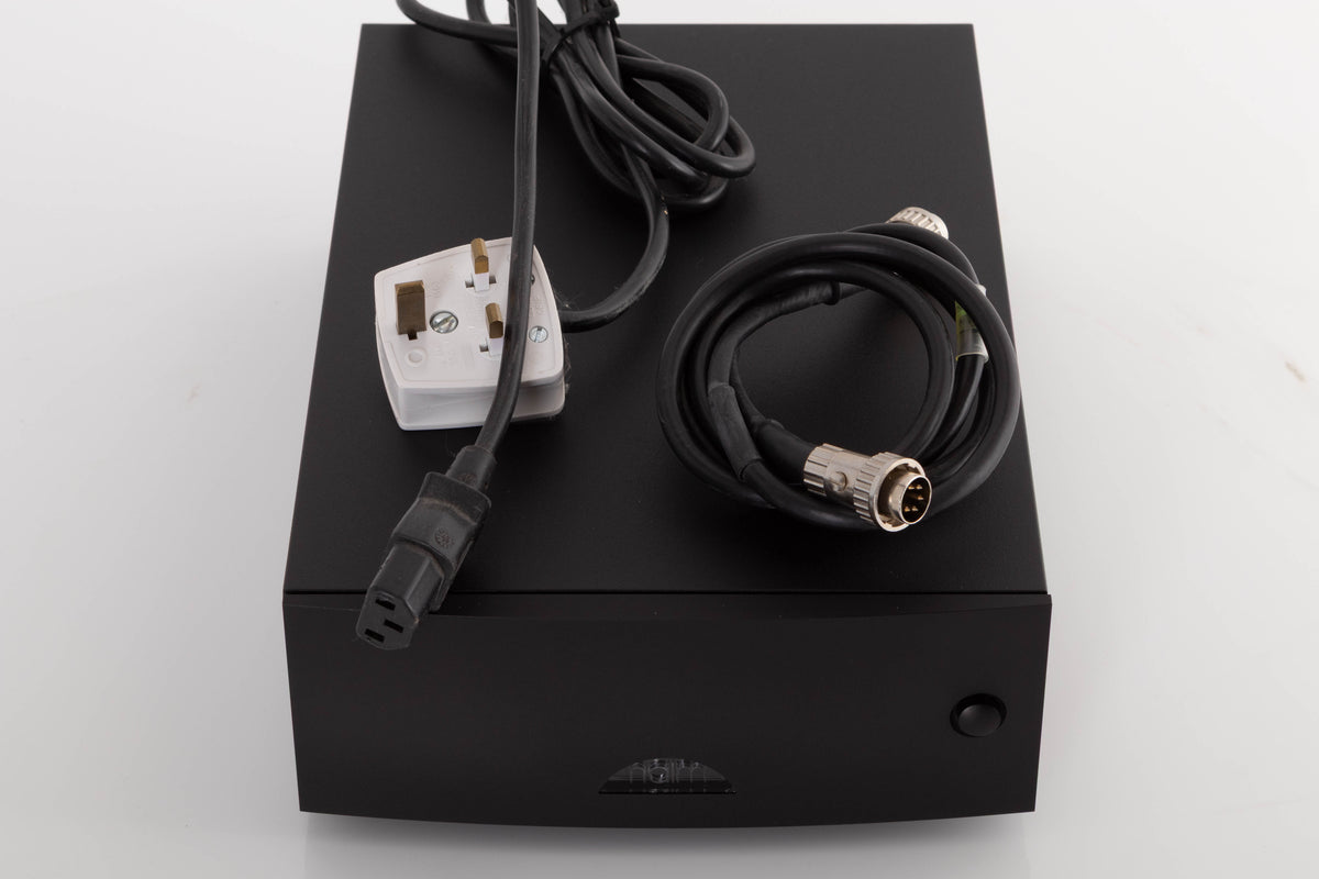 Top of a used Naim Hicap DR Power Supply in a Black finish showing Mains Cable and SNAIC5