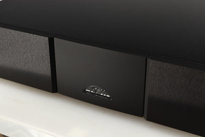 Close up of a used Naim CD555PS DR Power Supply in a black finish showing logo