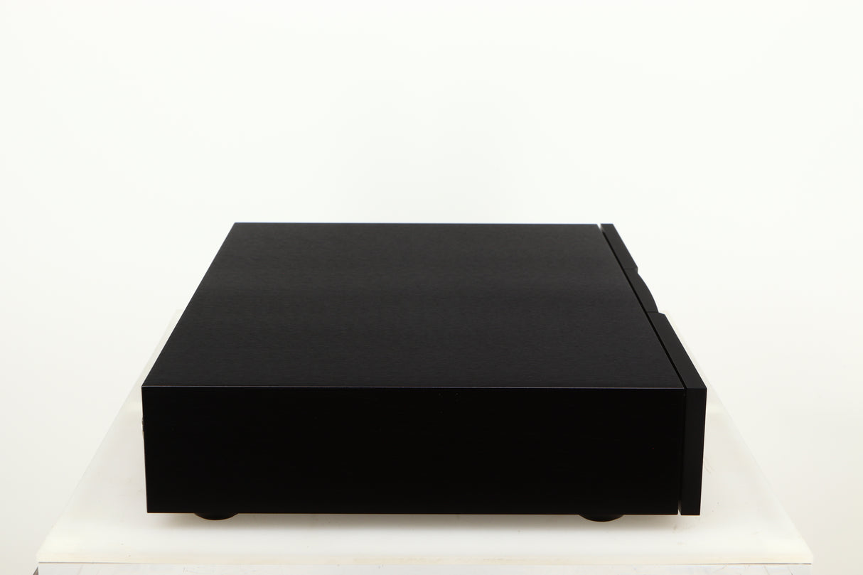Left side view of a used Naim CD555PS DR Power Supply in a black finish