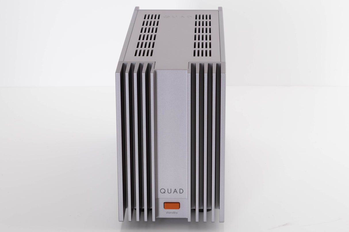 Front view of a used Quad 303 Power Amplifier in a Silver finish