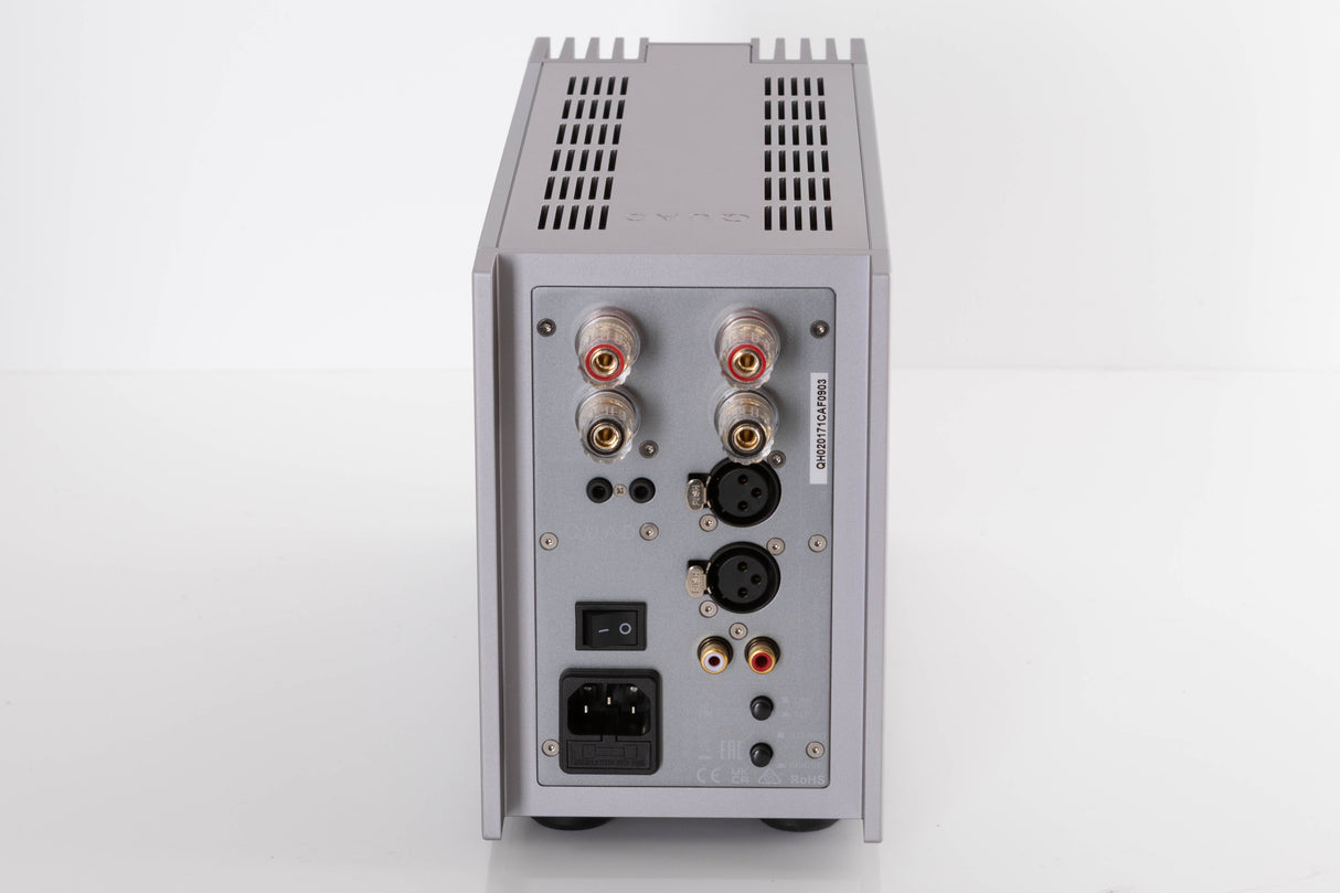 Rear view of a used Quad 303 Power Amplifier in a Silver finish showing Mains Input, XLR Inputs, Phono Inputs and Speaker Inputs