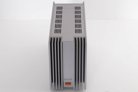 Top of a used Quad 303 Power Amplifier in a Silver finish