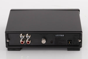 Rear view of a used Rega FONO MM MK5 Phonostage in a Black finish showing Phono Inputs, Phono Outputs and Power Input